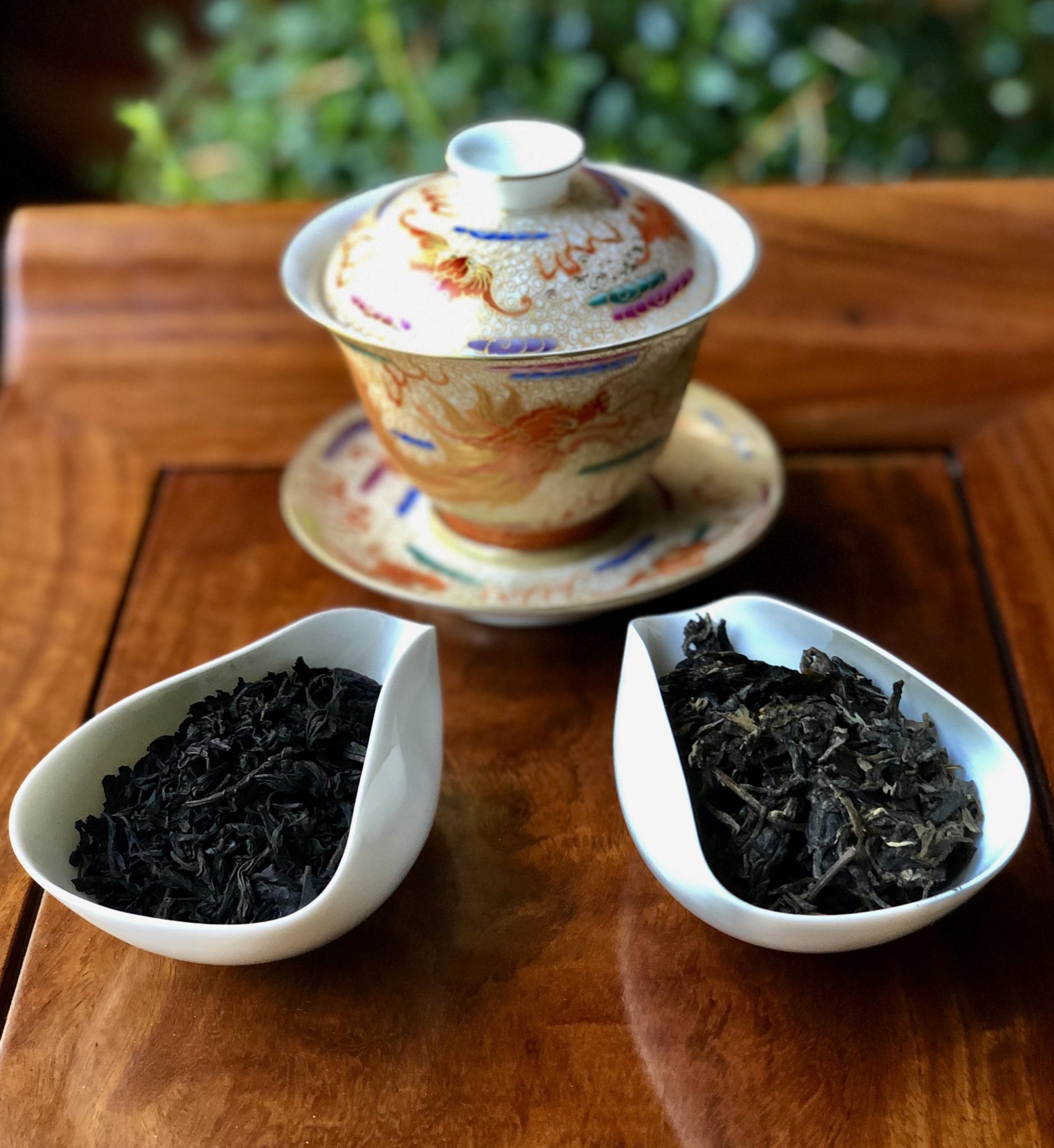 Tea pot and Tea leaves in the table
